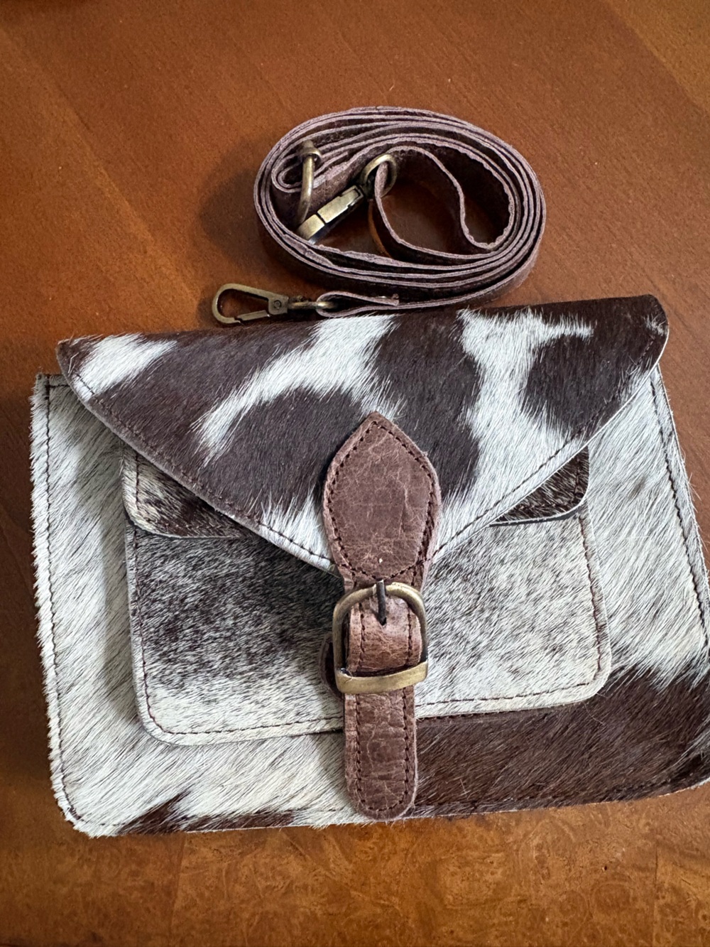 Buckle Cowhide Crossbody Bag in Brown and White
